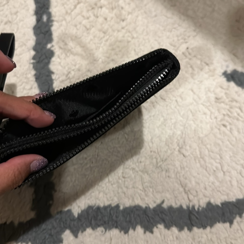 Kate Spade large wristlet. All black with two zippered sides. Can fit an iPhone. - Picture 3 of 3